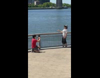 Red shirt guy white dress lady river