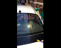 Woman misspells graduated on back windshield of car 