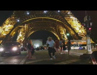 Eiffel tower guy camera dances white shirt 