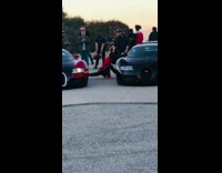 Lady does splits on two cars pt. 2
