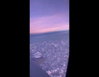 Plane fly over clouds look fluffy sunset