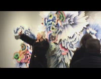 Black fur jacket colorful art selfie exhibit 