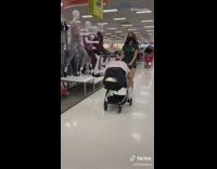 Girl pushes baby stroller white duck target 