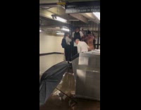 Submitter films water flood inside train station