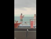 Girl bikini transparent robe rooftop cloudy faucet