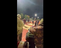 DJ plays music and people freestyle dance