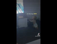 Curious baby daughter tries to turn off dads game console