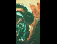 Black orange blue gold paints mix together 