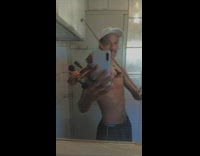 Guy in restroom records himself playing violin