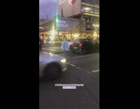 Girl blue fluffy gown middle street car