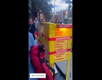 Kid dressed as Halal Guys food cart