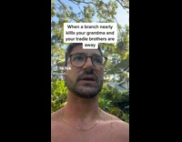 Man Cuts Up Branches to Pieces in Yard