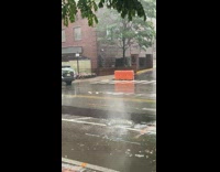 Underground water flooding causes manhole cover to move around 