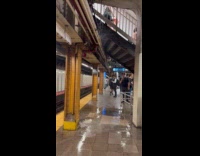 Rain water fall into subway near stairs