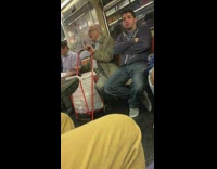Man sings song and slaps thighs loudly on subway train
