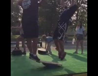 Collab scorpionmasters - Guy jumps on a seesaw to help his friend backflip, friend lands on his head and scorpions