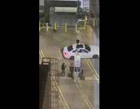 White car circle Level 9 post parking lot