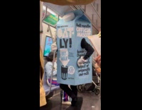 Oatly mascot spotted standing at F train