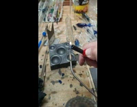 Glass Blower Makes a pipe small enough to fit a quarter