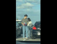 Couple surprising each other with Halloween gift basket 