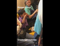 (DUPLICATE) young boy on train picking boogers booger patrol