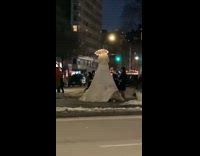 Guy under white dress crawls out