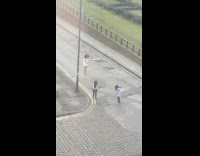 Woman white dress kick bend back street