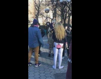 Guy with no more lockdowns sign park 