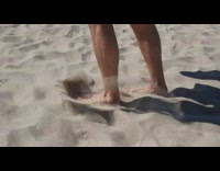 Guy stomp on sand that makes sounds