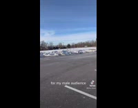 Guy throws giant metal spring on floor