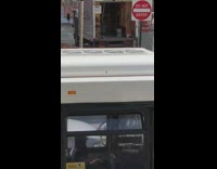 man street corner guitar arms open singing