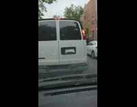 Van has paper where license plate should be