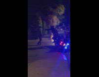 Motorcycle police officer slams car thief into sidewalk