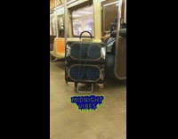 Collab Subway Creatures - Man Sits With Large Music Speakers that Light Up on Subway