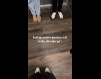 Woman telling strangers lie in elevator