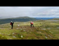 2 girls dance on mountains 