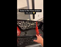 Man sees luxury cars parked at grocery parking garage 