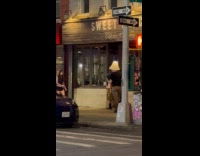 Man wears lamp on head while walking