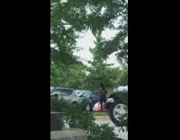 Girl blue jeans different pose parking lot