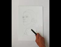 Guy waves black marker drawing appears paper 
