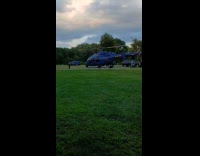 Police helicopter lifting off 