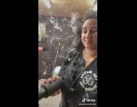 Husky dog shedding at groomers woman covered in fur 