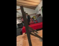 Guy runs on red table tries to RKO friend misses falls off fail