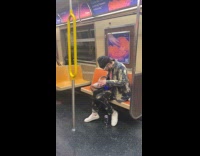 Man plays and remix music inside train