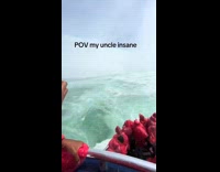 Man yells take under waterfall