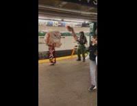 Guys wear halloween costume at subway in NY 
