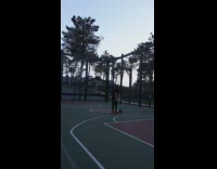 Man catches basketball in shirt and makes it in basket 