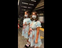 Two women dressed as twins from The Shining 