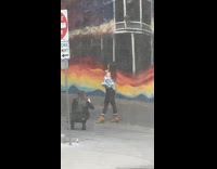 Woman off shoulder top graffiti wall alleyway