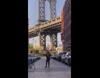 Lady selfie stick bridge drops phone 